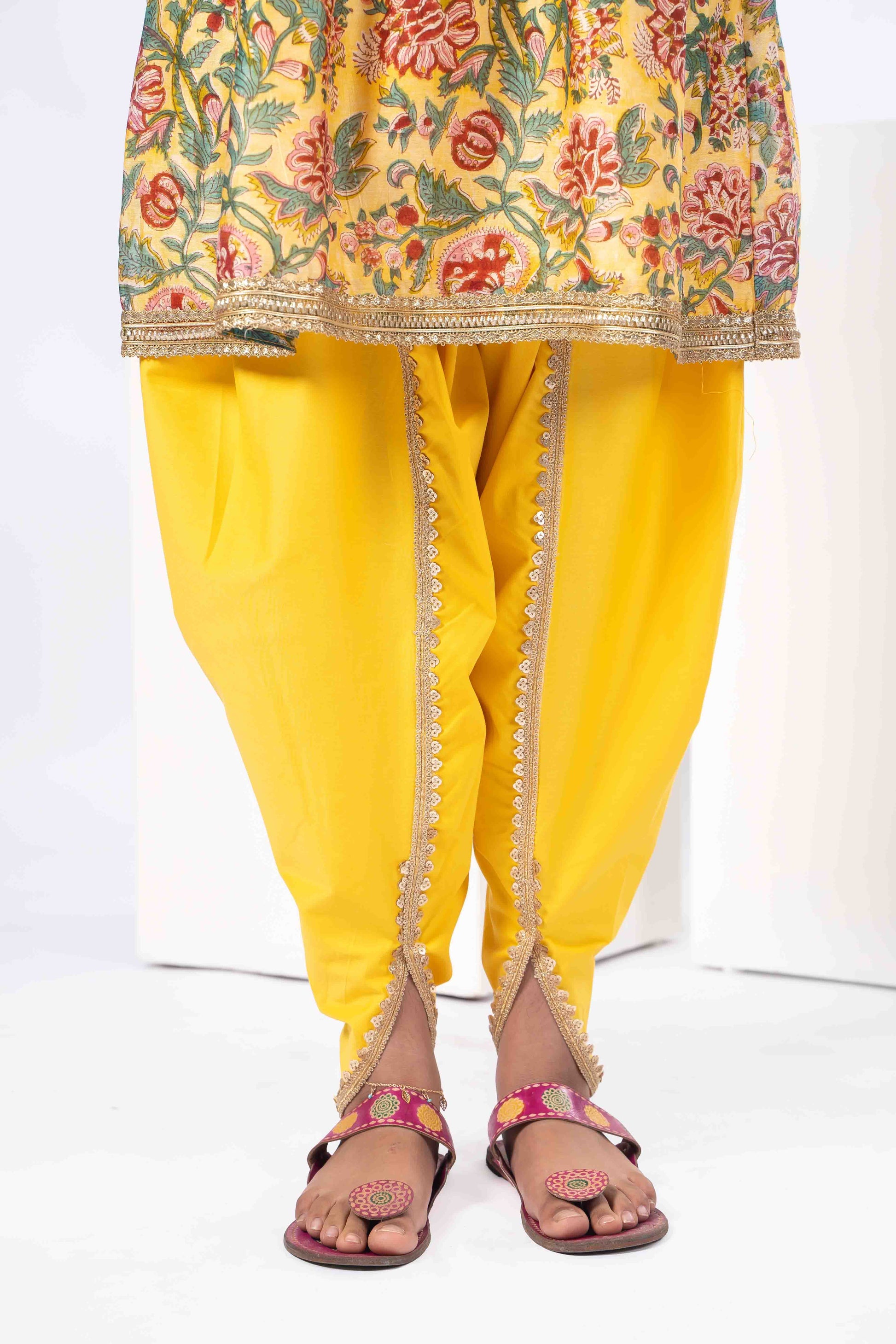 floral yellow girls kurta with yellow dhoti pants.